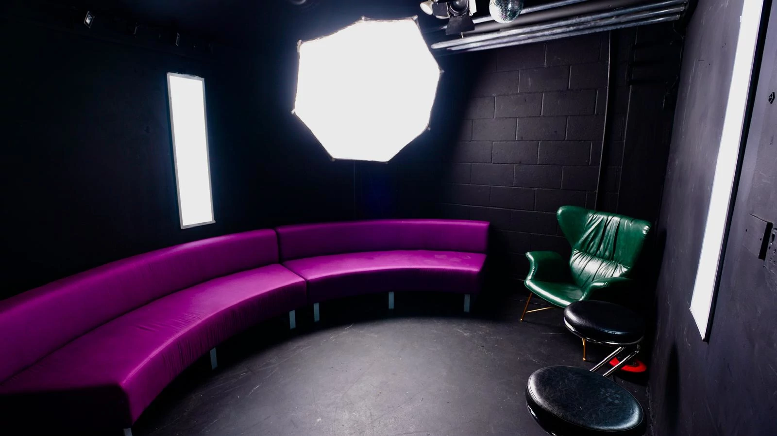 black studio purle sofa green chair 