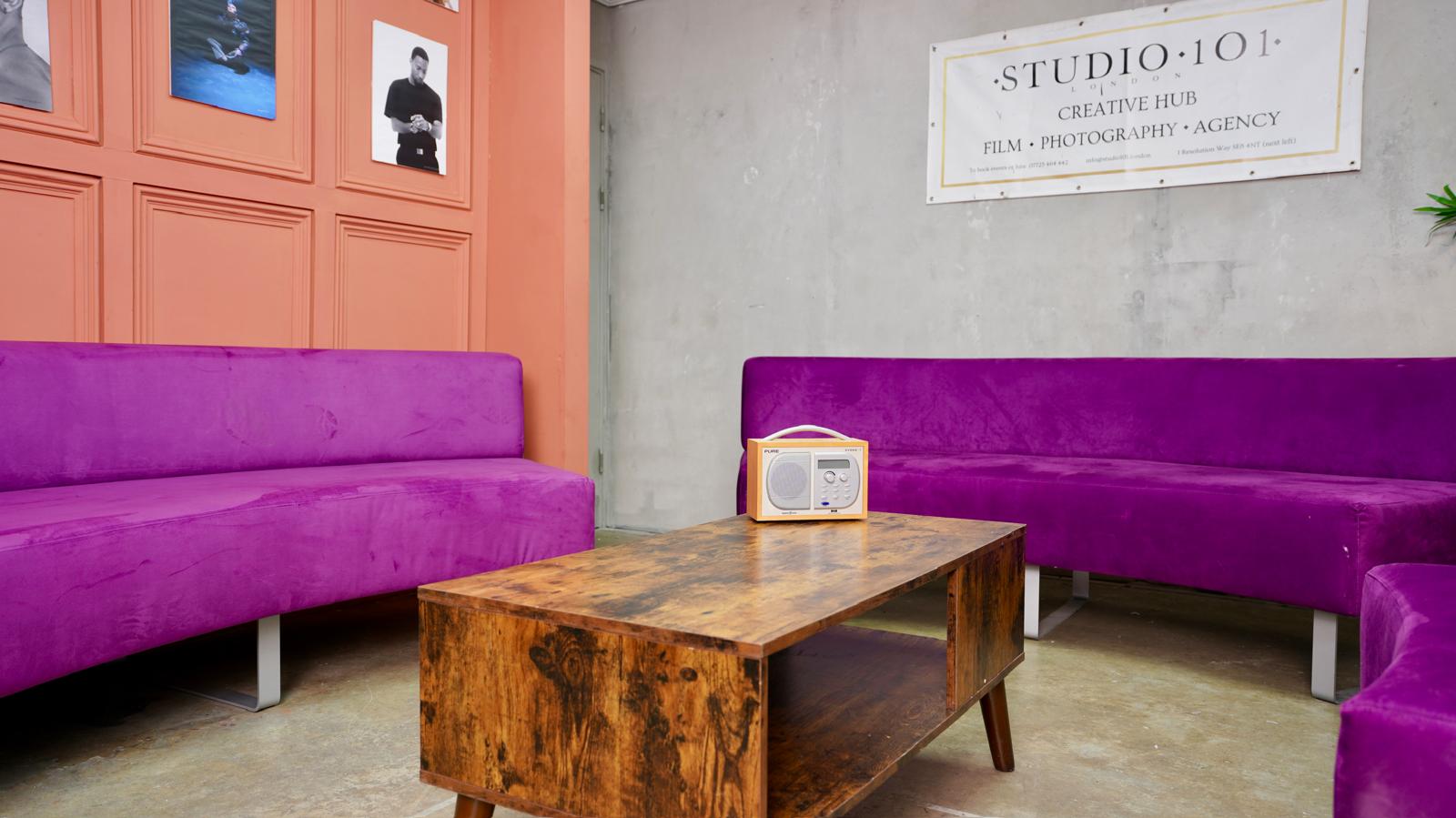 lounge purple sofa pink panel