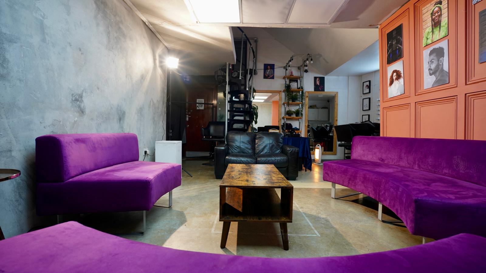 lounge purple sofa spot light