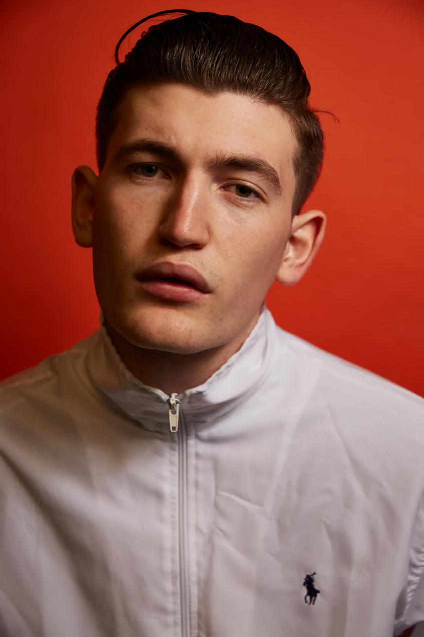 portrait joswhiteman white polo jacket question man